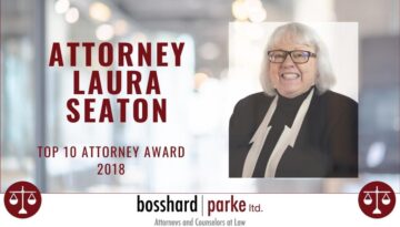 Attorney Laura Seaton receives the 2018 top 10 attorney award.