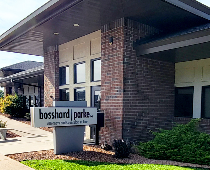 Bosshard Parke Law Firm sign outside of the building entrance in La Crosse, Wisconsin.