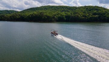 A pontoon on a river along the bluffs of La Crosse, Wisconsin.