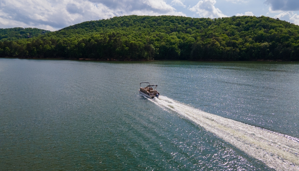 A pontoon on a river along the bluffs of La Crosse, Wisconsin.