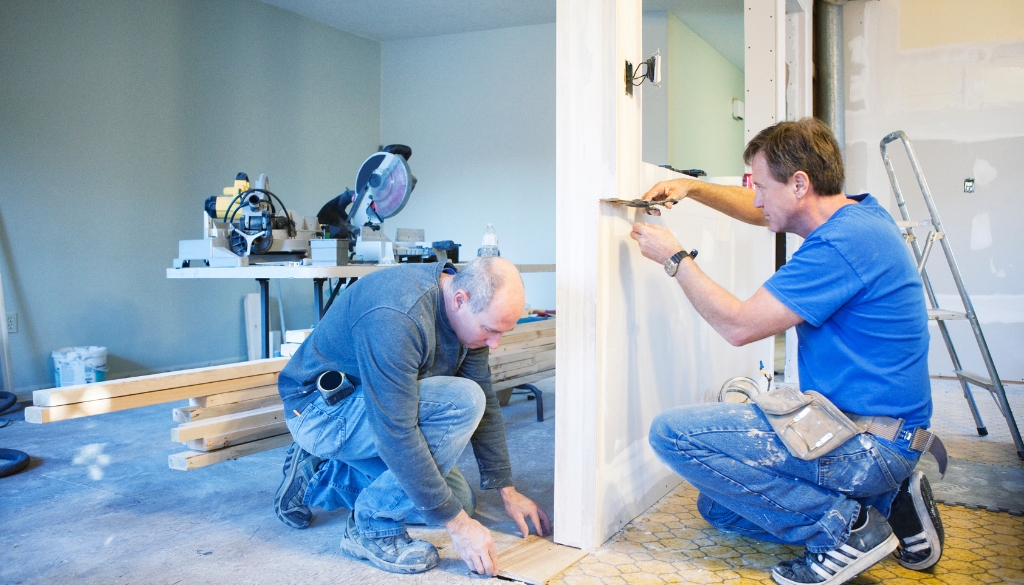 Two men working on a home renovation project.