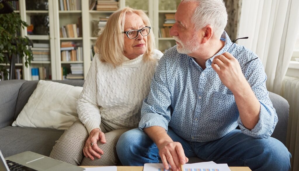 A newly retired couple discussing their estate plans.