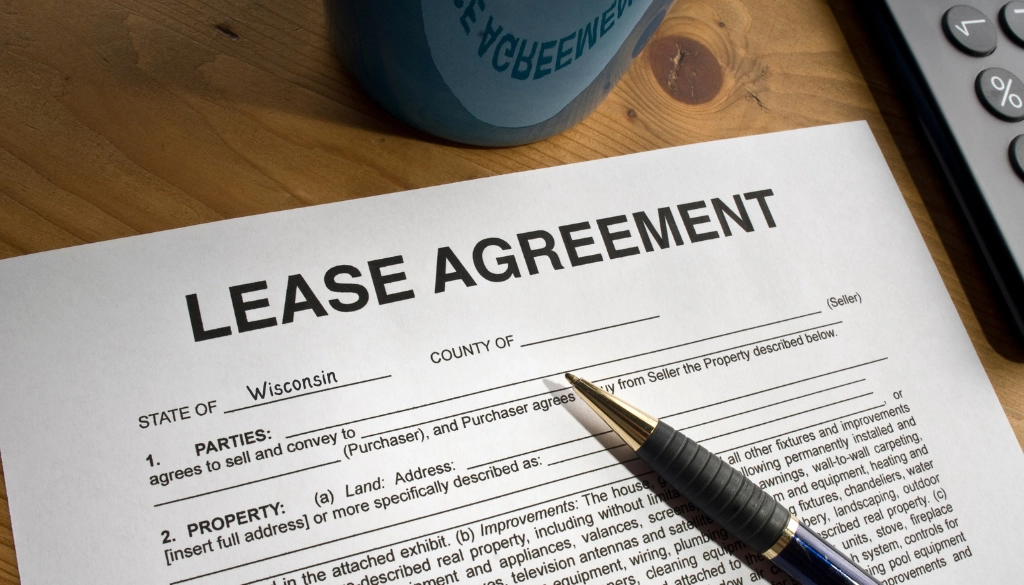 Lease agreement form for a rental property in Wisconsin, highlighting tenant and landlord rights and responsibilities.